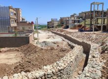 ساخت دیوار سنگی مسیر رودخانه شهرک شهید قاضی شهر اردکان